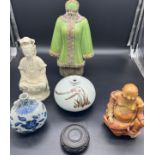 A Selection of oriental wares to include tunic pottery vase, Blanc de Chine buddha figure, Soapstone