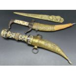 Two antique daggers with sheaths and brass worked and engraved letter opener.