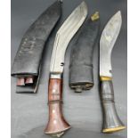 Two Kukri Knives with sheathes.