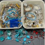 Two small trays of costume jewellery to include necklaces, brooches, earrings, Fruit knives and