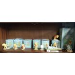 Shelf of Royal Doulton winnie the pooh figures to include summers day picnic etc