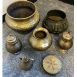 A Selection of Indian brass wares to include planters, Urn vases with lids, Bulbous heavy worked