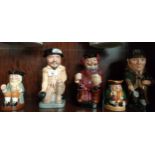 Shelf of Royal Doulton Toby jugs includes sir Francis Drake and Sherlock Holmes