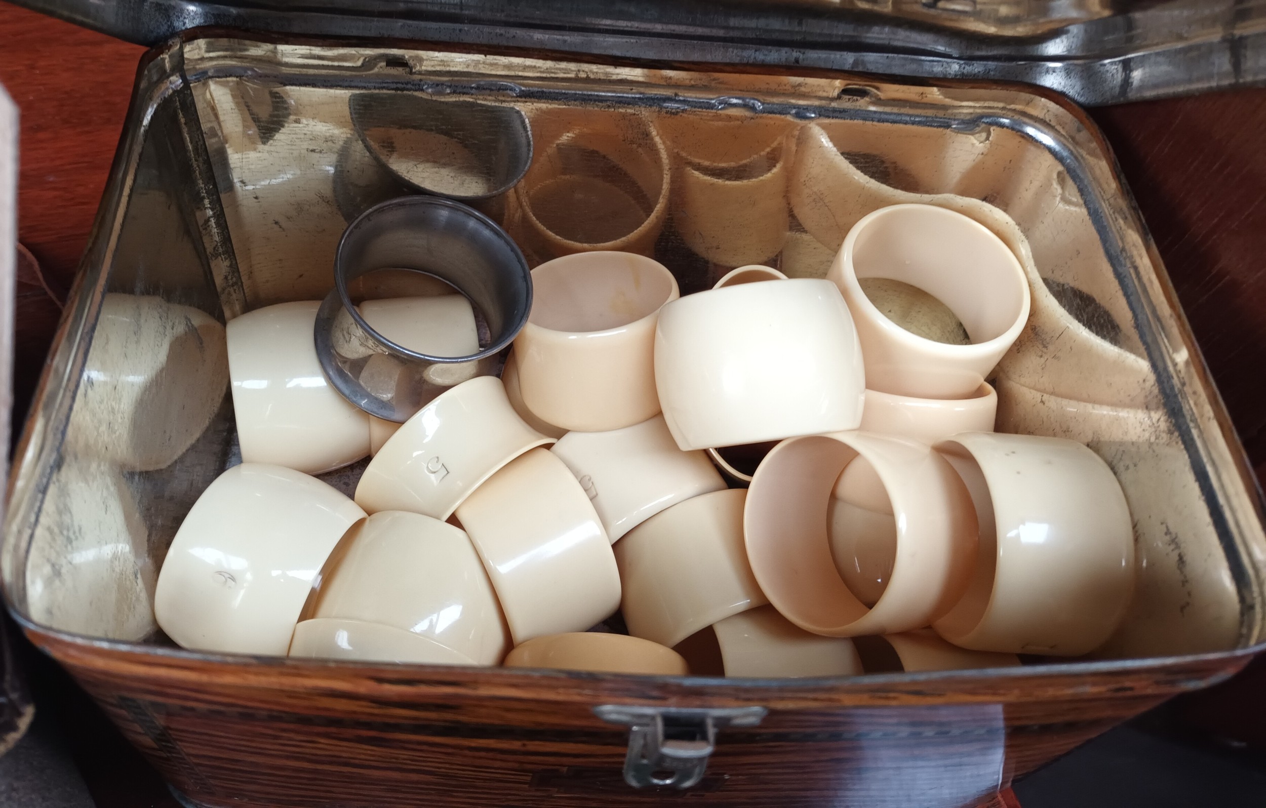 A lot of vintage tins together with a respirator and napkin rings - Image 2 of 2