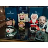 Collection of Small Royal Doulton Toby jugs includes Santa Klaus, the snowman with boxes