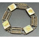 Sterling silver Hong Kong made bracelet. Made up off small abacus, mother of pearl plaques and