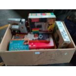 Large box of vintage games together with Vulcan sewing machine etc