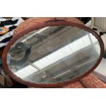 Antique oval dark wood framed mirror