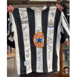 1990's Newcastle United signed football top with signature list.