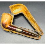 Antique smoking pipe, fitted with an amber end and white metal collar, comes in a fitted case by A