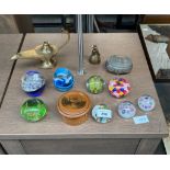 A Quantity of art glass paperweights, Mauchline ware thread box, brass genie lamp and metal