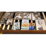 A Collection of Movie star pictures framed to include Marilyn Monroe, Godfather cast and various