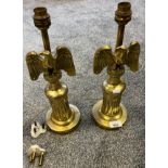A Pair of heavy column table lamps fitted with eagle toppers. [35cm high]