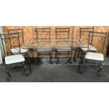 Modern heavy wrought iron dinning table with glass top with 6 chairs