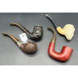 Four various vintage smoking pipes includes Cobra made pipe, Sterling silver collar smoking pipe,