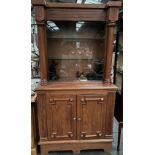 Antique style column display cabinet.