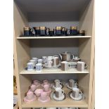 Three shelves of retro coffee services to include Gold and black Portmeirion pottery service, Thomas