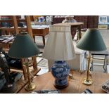 Two brass table lamps and blue and white Chinese blossom design table lamp