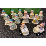 A large collection of Beswick clown figures with boxes