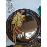 Antique moulded round framed mirror and pelham puppet