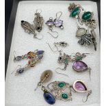 A Lot of 10 pairs of silver earrings all fitted with various stones.