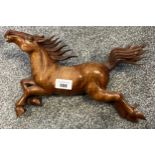 Antique Chinese hand carved galloping horse wall sculpture. [32cm in length] Fitted with glass eyes.