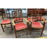 A Set of four oak dining chairs and matching carver chairs.