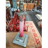 Antique paraffin lamp base converted to electric.