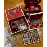 Three jewellery boxes containing a quantity of costume jewellery