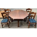 Solid oak dining table with four heavy oak chairs