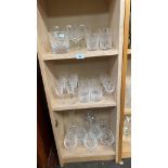 Three shelves of crystal glasses to include large facet cut whisky glass, Edinburgh crystal whisky