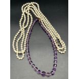 Antique Amethyst graduating bead necklace, together with a large pearl necklace.