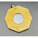 9ct gold cigar cutter pendant. Stainless steel blade.