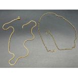 Two 9ct gold neck chains [Lengths 44cm and 42cm] [7.01grams]