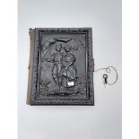 A Victorian photograph album with an in-built musical mechanism [comes with wind up key] finished