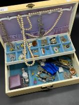 Jewellery box containing a quantity of costume jewellery, watches and silver chains etc