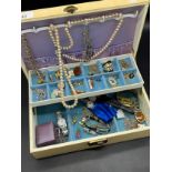 Jewellery box containing a quantity of costume jewellery, watches and silver chains etc
