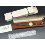 Vintage Gucci Quartz gold plated wrist watch, comes with boxes and booklet.