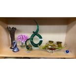 Shelf of Art Glass to include glass bowl, Caithness vase and green glass sculpture.
