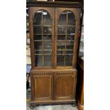 Antique oak bookcase unit. Two glass and oak top section doors.