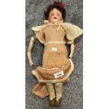 Antique German bisque head doll, nodding eyes and teeth fitted. Comes with leather and porcelain leg