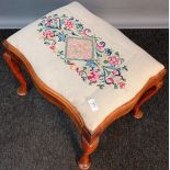 19th century stool, the embroidered cushioned seat, raised on cabriole legs ending in pad feet. [