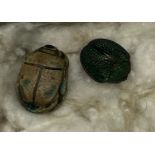 Antique Egyptian revival carved scarab beetle together with a real scarab beetle.