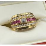 High grade gold [18ct-24ct- tested] ladies diamond and ruby stone ring. Baguette cut diamond