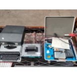 Workshop Battery Charger, Keeler Transformer Charger and Silver REED Typewriter.