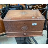 Wooden sewing box detailed with carved trims and panels