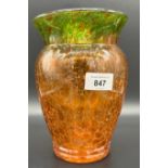 A piece of Art Glass in a vase form, orange body and green rim. [Possibly Scottish] [21cm high]
