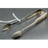 A Pair of Georgian Glasgow silver sugar tongs