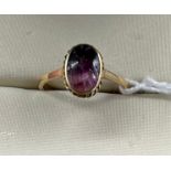 Antique 9ct gold and Amethyst stone ring. [Stone has various cracks showing- possibly raw