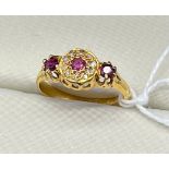 Antique/ vintage Sheffield 18ct yellow gold ladies ring set with rubies and diamond cluster. [Ring